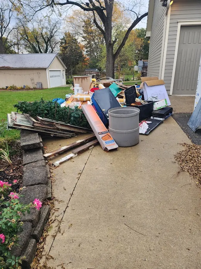 Dumpster being loaded with debris for Residential Dumpster Rental in Lindenwold